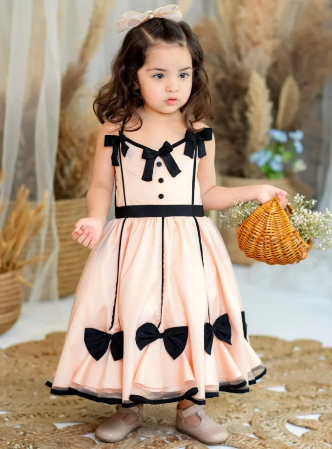 Peach Dress With Black Bow
